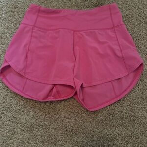 pink lululemon speed ups. size 0 length 2.5
